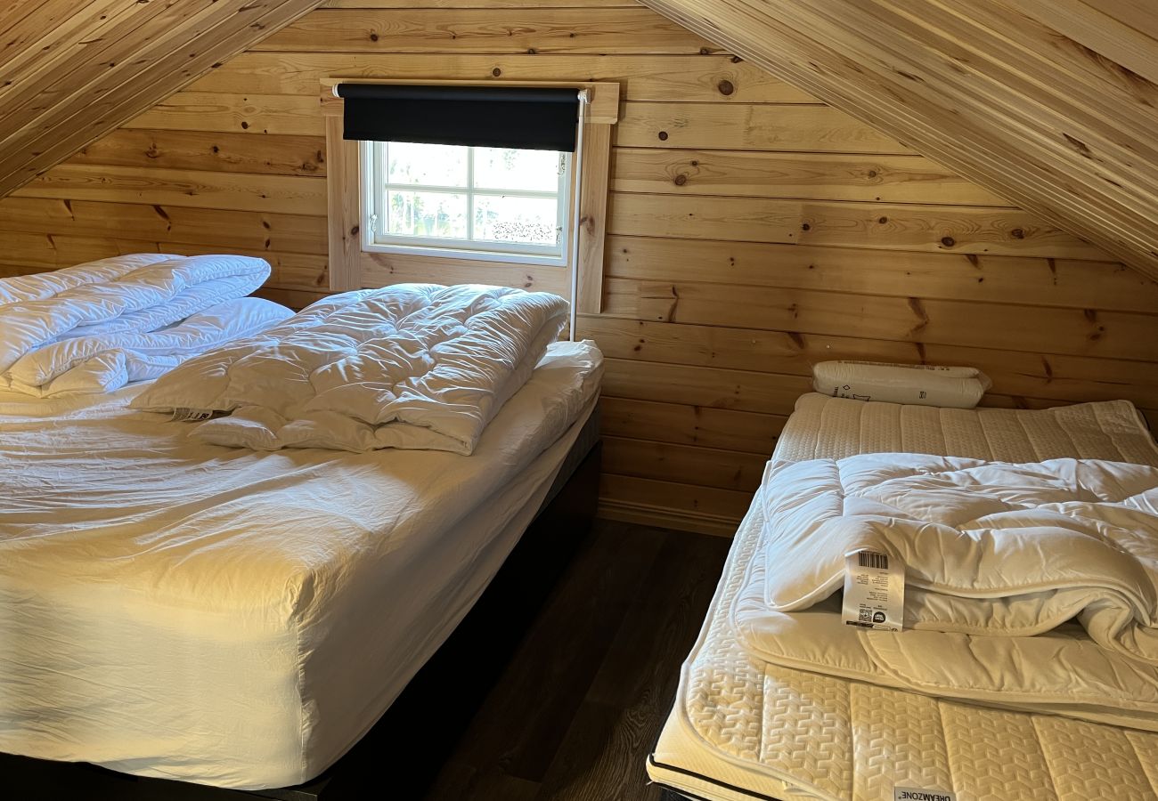 Ferienhaus in Vena - Neu gebautes blockhaus mit seeblick bei Hultsfred | SE05086