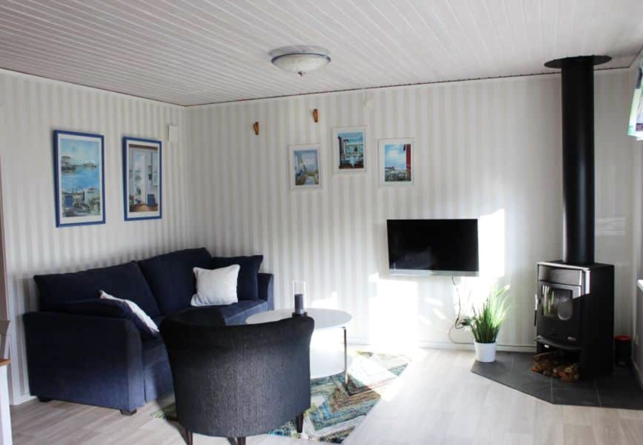 Ferienhaus in Henån - Frisches Ferienhaus mit Seeblick und Ruderboot | SE09156