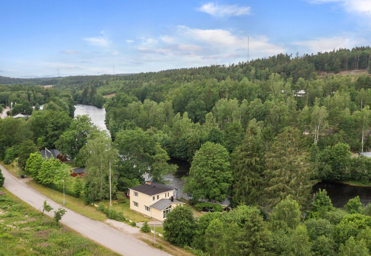 Drone view of the building and surrounding forrest