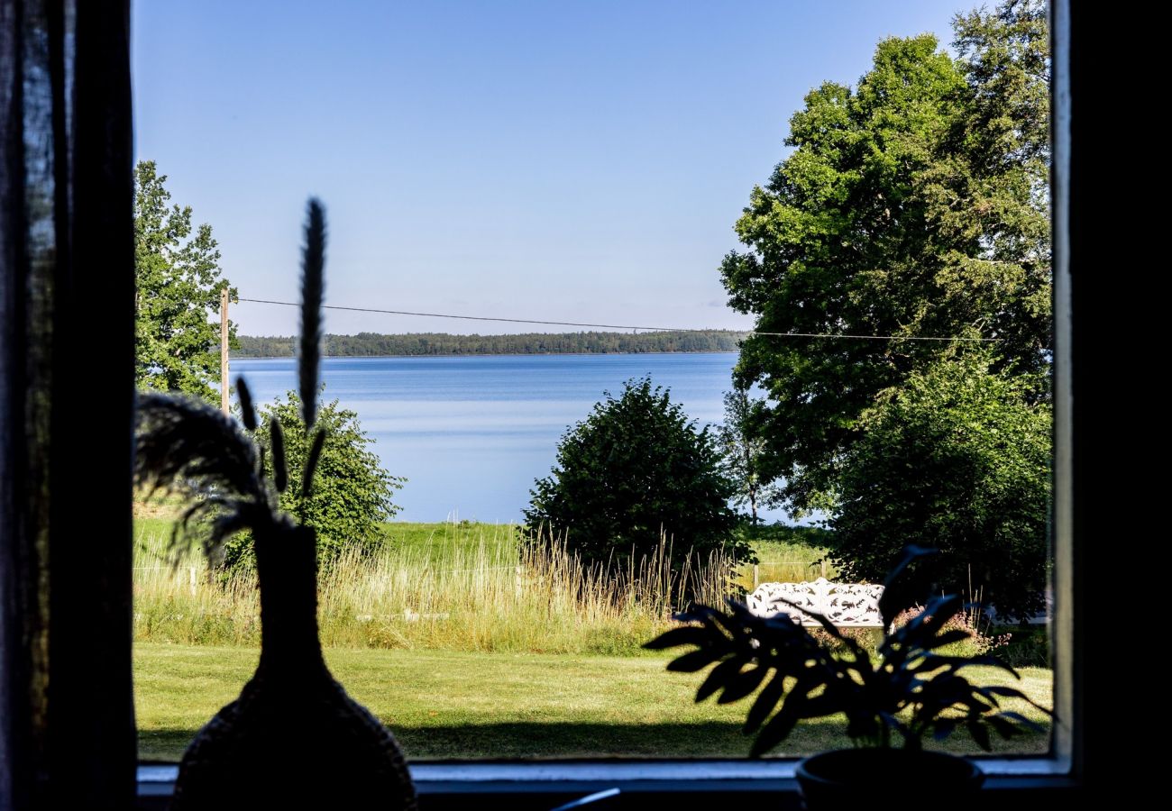House in Rydaholm - Fantastic holiday home with a sandy beach by Lake Furen