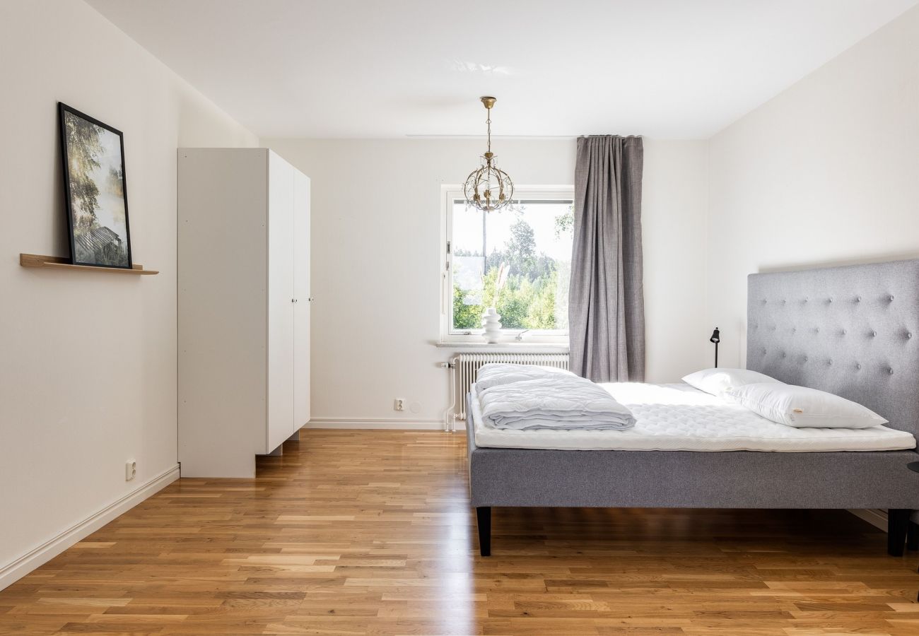 House in Rydaholm - Fantastic holiday home with a sandy beach by Lake Furen