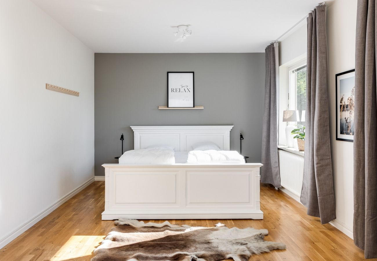 House in Rydaholm - Fantastic holiday home with a sandy beach by Lake Furen