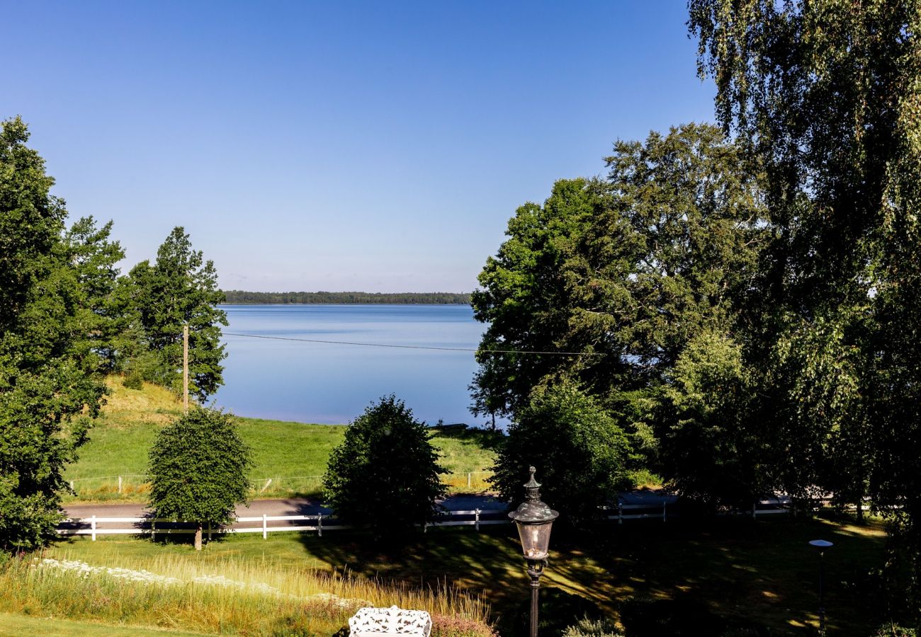 House in Rydaholm - Fantastic holiday home with a sandy beach by Lake Furen