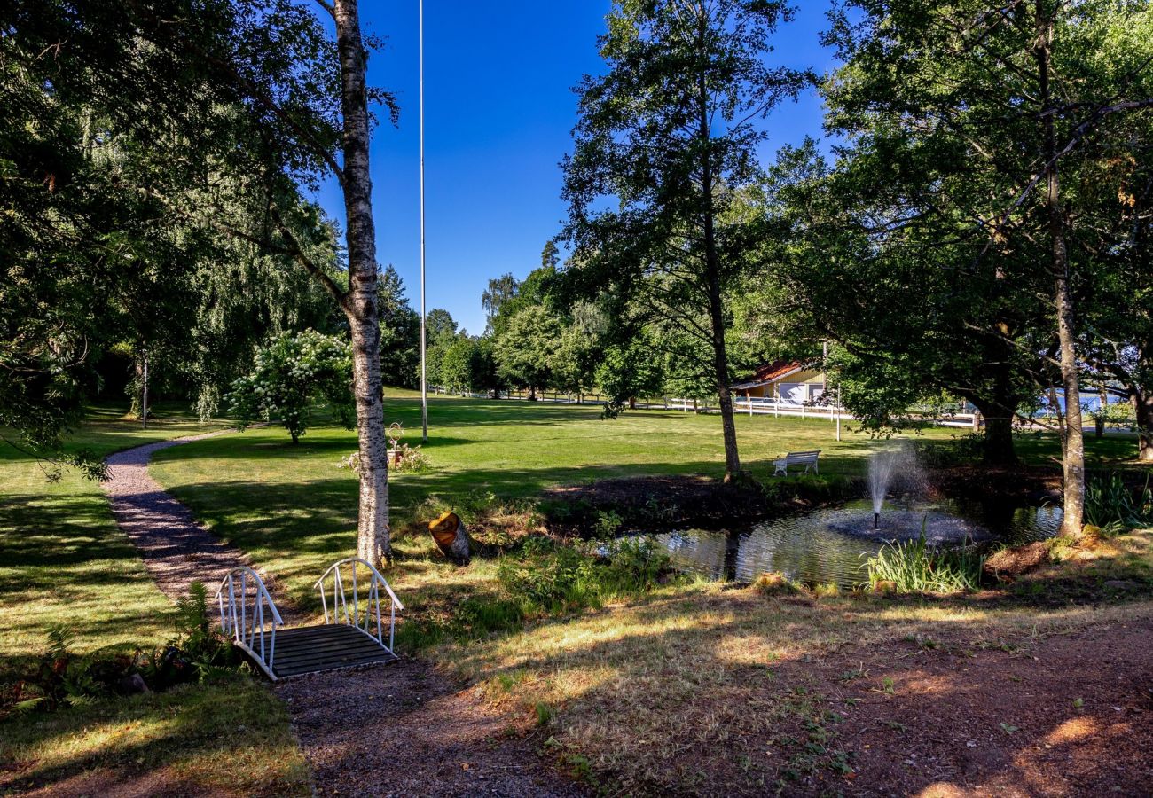House in Rydaholm - Fantastic holiday home with a sandy beach by Lake Furen