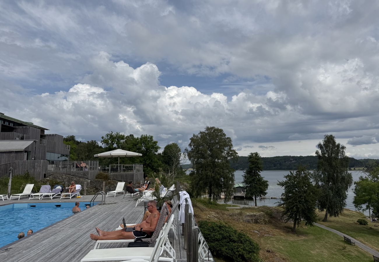 House in Munkedal - Log cabin with pool, sauna and boat by Torreby Castle | SE09080